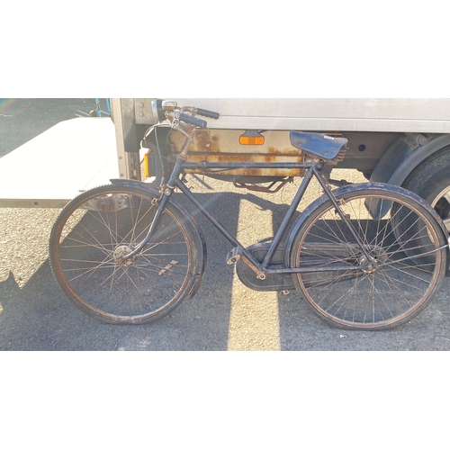 434 - Vintage black bicycle with a rusted metal parts.