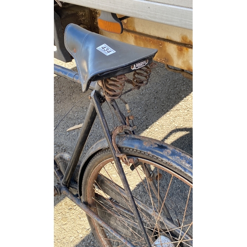 434 - Vintage black bicycle with a rusted metal parts.