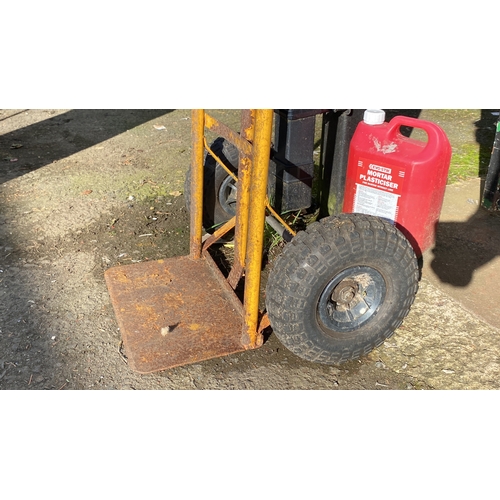 436 - Yellow metal sack trolley with two pneumatic wheels, by Olympia.