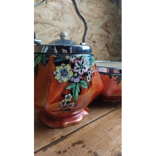 367 - Vintage Carlton Ware lusterware biscuit jar and dish with colorful floral design. Features chrome-pl... 