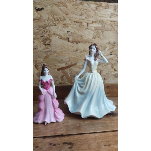 370 - 2 Coalport figurines of elegant ladies in period gowns, featuring intricate detailing and pastel ton... 