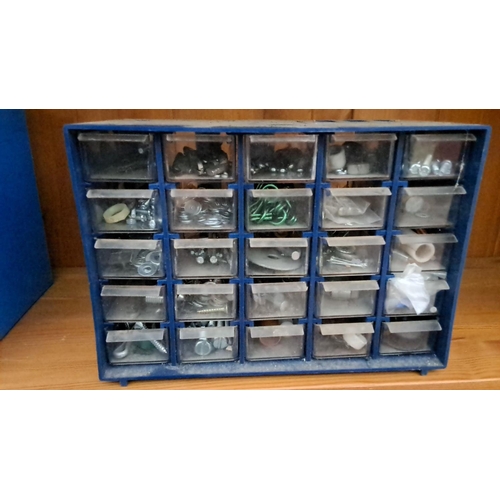 306 - Plastic storage drawers featuring a blue frame and multiple transparent drawers. The drawers contain... 