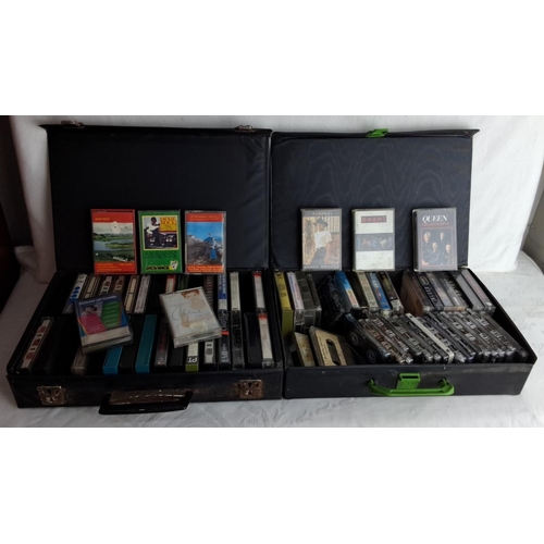 308 - Collection of audio cassette tapes, stored in two black case holders. Various artists and titles inc... 