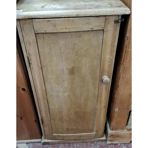 319 - Vintage wooden cabinet with single front door and three interior shelves.