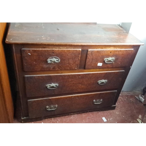 328 - Antique wooden chest of drawers with four spacious drawers and ornate metal handles, featuring a lin... 