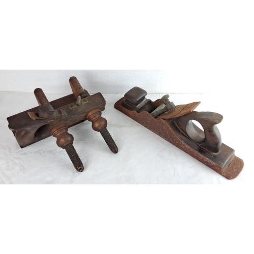 338 - Two vintage wooden hand planes from the early 20th century. One includes intricate adjustment screws... 