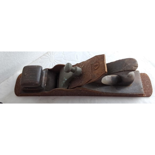 338 - Two vintage wooden hand planes from the early 20th century. One includes intricate adjustment screws... 