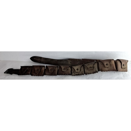 343 - Antique leather ammunition belt with multiple pouches and metal buckle, featuring aged patina, from ... 