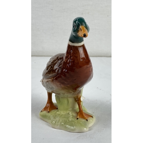 14 - Goebel W. Germany porcelain figurine of a mallard duck, marked 1977. Features fine glossy detail and... 