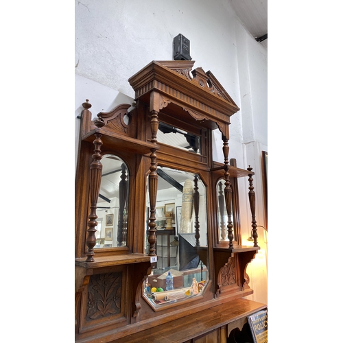 18 - Victorian oak overmantel mirror with carved detailing. Featuring multiple mirrored panels and decora... 