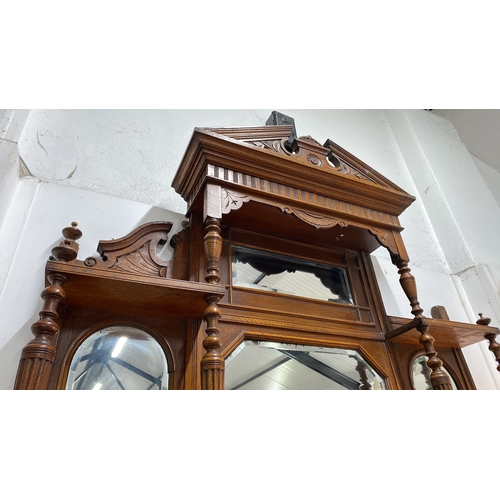 18 - Victorian oak overmantel mirror with carved detailing. Featuring multiple mirrored panels and decora... 