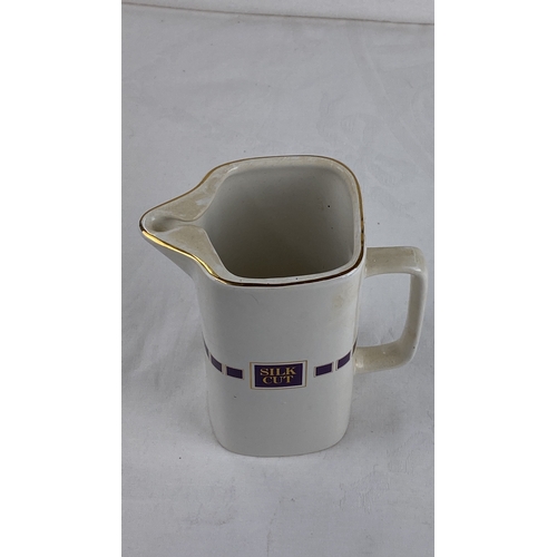 32 - HCW ceramic jug, 