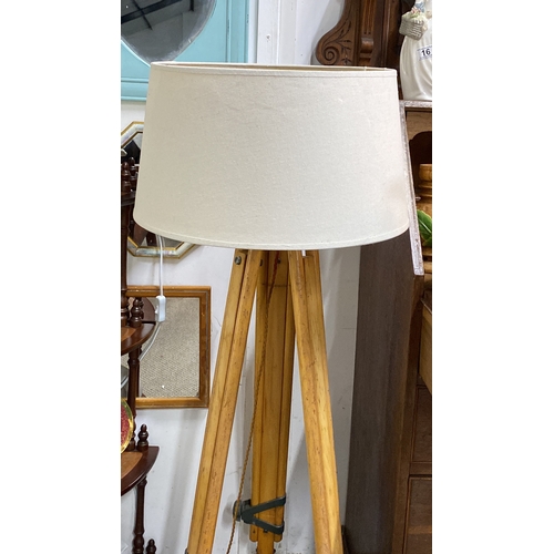 37 - Vintage tripod floor lamp with beige fabric shade, featuring a wooden tripod base, 49cm tall includi... 