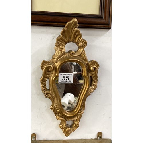 55 - Rococo-style wall mirror and shelf, ornate gold-painted design, shelf 10