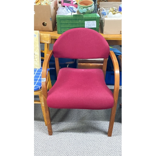 421 - Mid-Century Modern chair with curved wooden arms and red fabric upholstery.