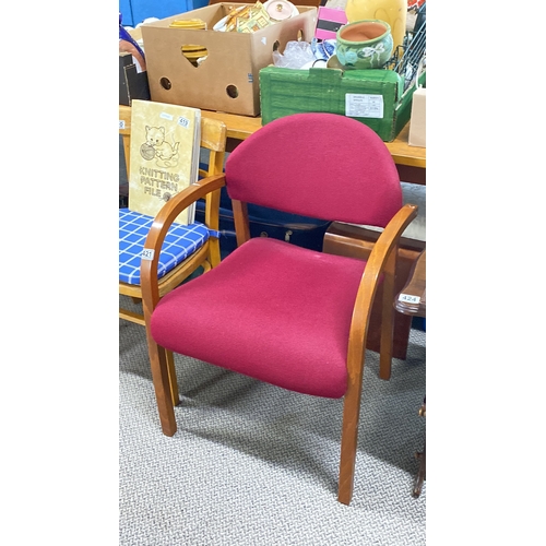 421 - Mid-Century Modern chair with curved wooden arms and red fabric upholstery.