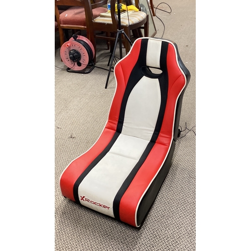 425 - X Rocker gaming chair in red, white, and black faux leather.