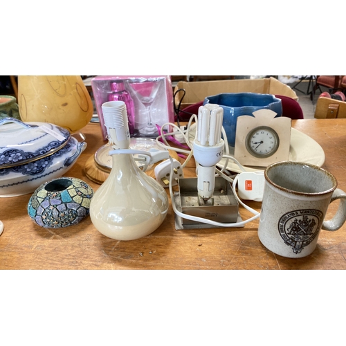 428 - Vintage ceramic tableware, assorted clocks, glass and metal decor, mugs, and vases.