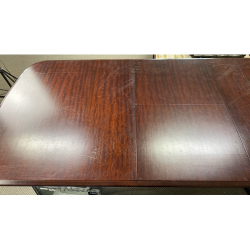 441 - Mahogany dining table, approximately 150 cm long, featuring dark finish and classic design with cabr... 