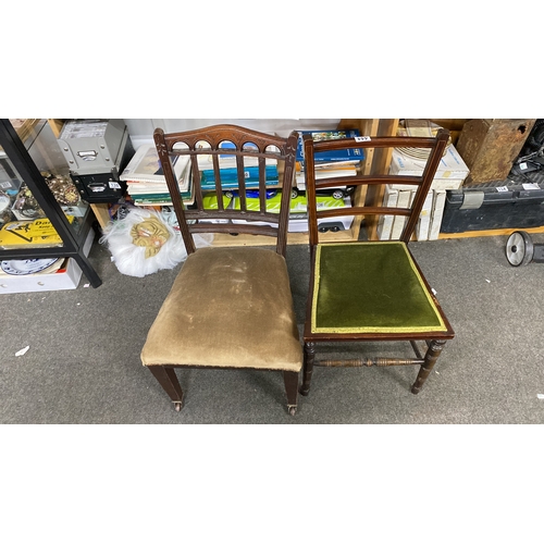 444 - Two vintage wooden chairs, featuring carved details and velvet upholstery.