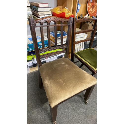 444 - Two vintage wooden chairs, featuring carved details and velvet upholstery.