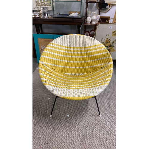 445 - Mid-Century Modern woven patio chair with yellow and white stripes.