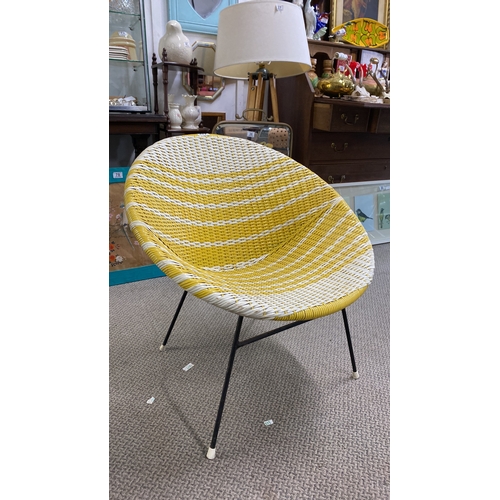 445 - Mid-Century Modern woven patio chair with yellow and white stripes.