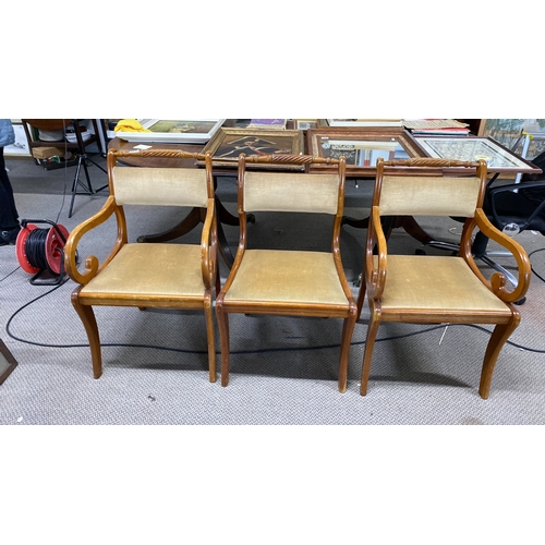 447 - Set of three Regency-style chairs with carved wood frames and upholstered seats.