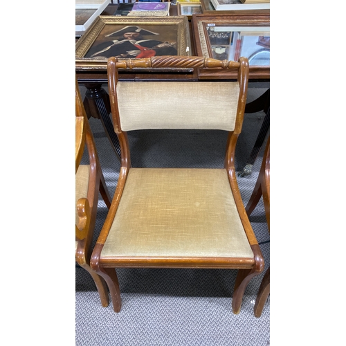 447 - Set of three Regency-style chairs with carved wood frames and upholstered seats.