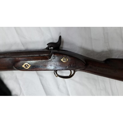 100 - 19th-century percussion cap rifle, dark wood stock, metal accents. Distinctive crown mark on lock me... 