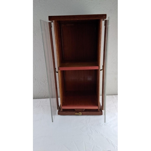 11 - Vintage wooden counter top display cabinet with hinged doors.