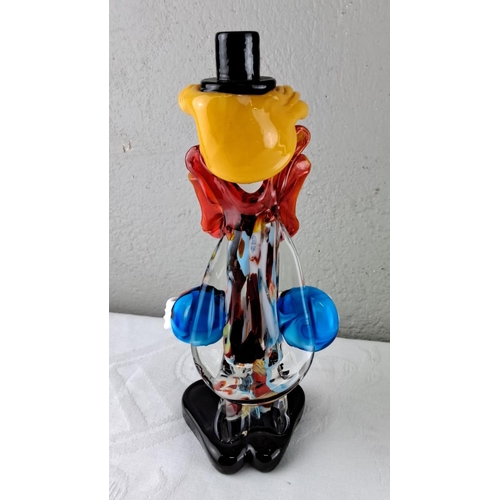 33 - Murano glass clown figurine with vibrant colours, including red, yellow, and blue. Accompanied by a ... 