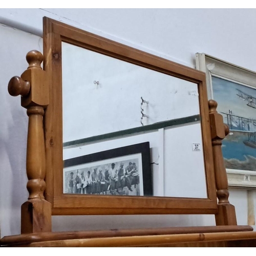 37 - Wooden framed mirror with elegant turned posts.