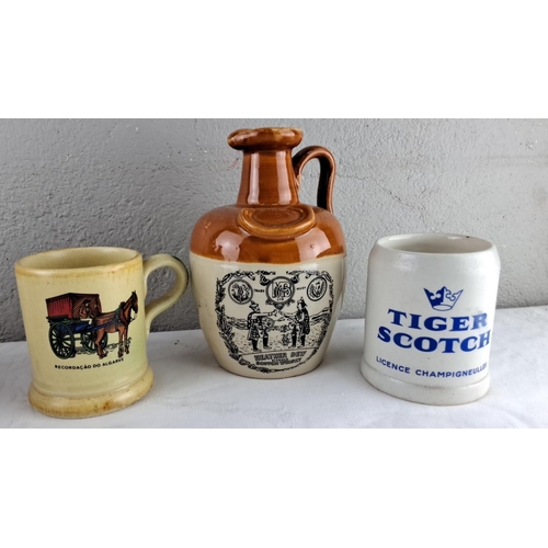 46 - Collection of seven assorted beverage vessels, including vintage stoneware jugs and branded glasswar... 