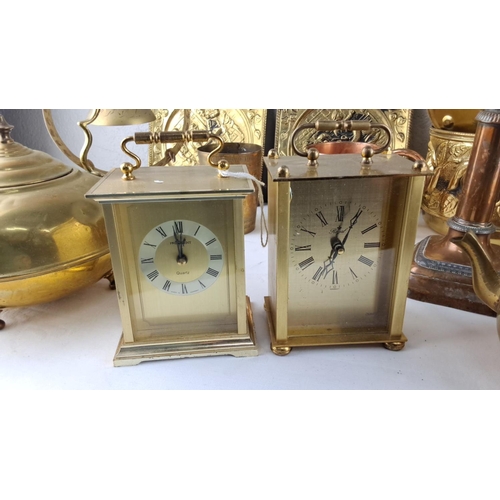 48 - Assorted vintage brass and copper items, including two mantel clocks marked 