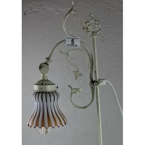 5 - Vintage wrought iron table lamp with an ornately designed arm and a fluted glass shade. Approximatel... 