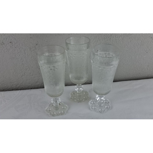 6 - Set of three textured glass goblets and a Galway Crystal perfume bottle, featuring a modern geometri... 