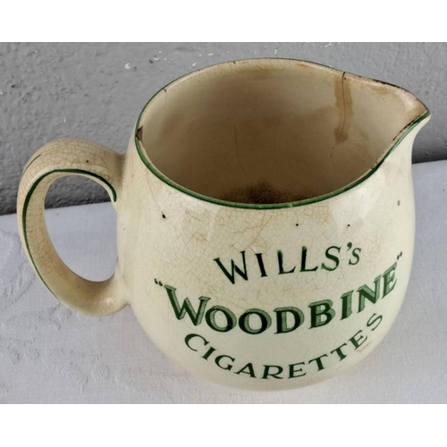 60 - Ceramic advertising jug featuring 