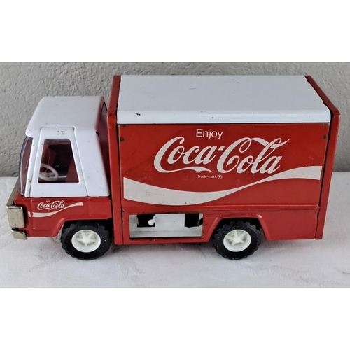 71 - Vintage Coca-Cola delivery truck toy features classic red and white branding. Made of metal and plas... 