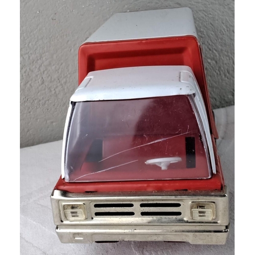 71 - Vintage Coca-Cola delivery truck toy features classic red and white branding. Made of metal and plas... 