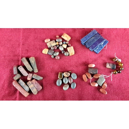 80 - Assorted mixed gemstone beads including jasper, lapis lazuli, and goldstone. Various shapes and size... 