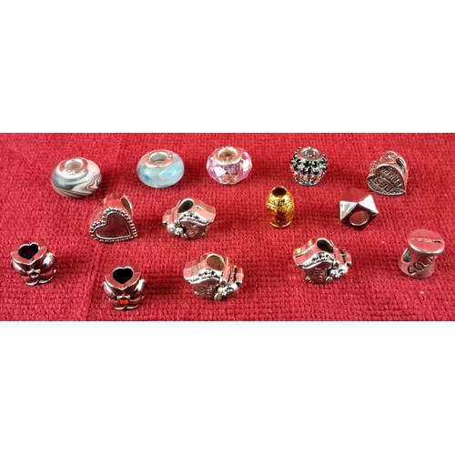 85 - Collection of varied charm beads, including silver-toned heart and floral designs, colorful glass, a... 