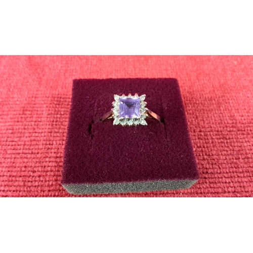 95 - 9ct Gold ring featuring a square amethyst centre stone surrounded by sparkling diamonds, marked 9ct ... 