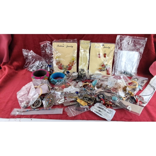 96 - Mixed lot of assorted fashion jewelry including necklaces, bracelets, earrings, and pendants in a va... 