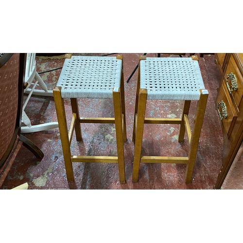 475 - Pair of Scandinavian-style woven stools with light wood frames. 69cm height