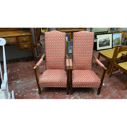 486 - Pair of antique high-back armchairs with wooden frames and patterned pink upholstery. Chair height 9... 