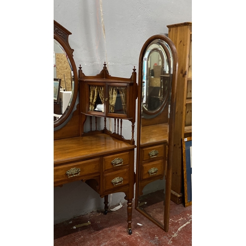 488 - Mahogany dressing table with oval mirror and ornate brass handles, featuring five drawers and side s... 