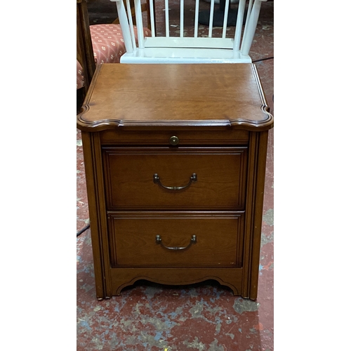 500 - Slientnight Mahogany side table with two drawers, featuring brass handles and decorative corner deta... 