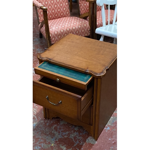 500 - Slientnight Mahogany side table with two drawers, featuring brass handles and decorative corner deta... 