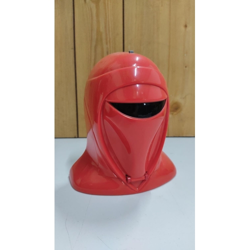 452 - Plastic Star Wars Imperial Guard Helmet with interior detailing and a miniature spacecraft. Approxim... 